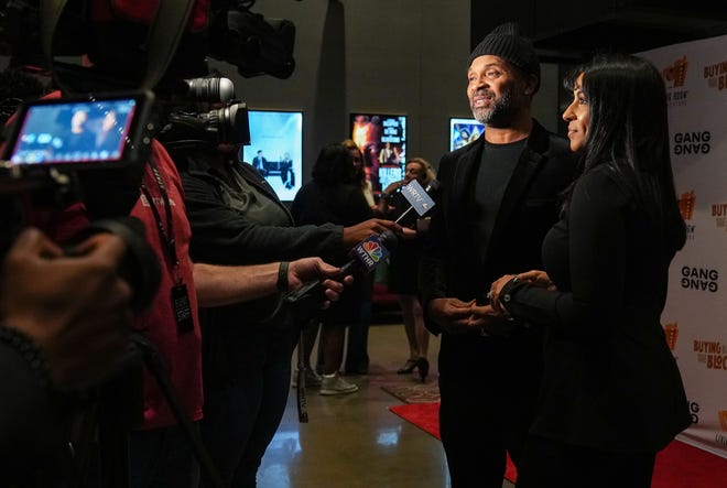 Mike Epps and Krya Epps talk to reporters on Wednesday, Nov. 8, 2023, during a special screening of new HGTV two-episode series “Buying Back the Block” at The Living Room Theaters at the Garage in Indianapolis.