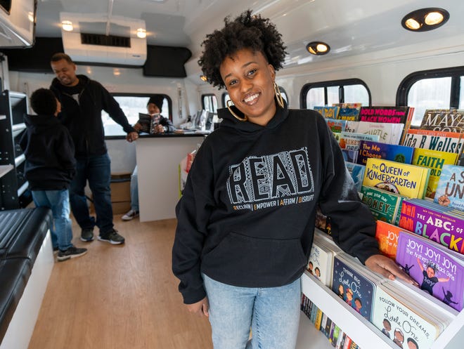 Natalie Pipkin, owner of Black Worldschoolers, is parked along with family members outside Newfields, Indianapolis, Jan. 15, 2023, and is part of a new crop of mobile businesses.