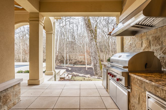 This $5.4M Indianapolis property featuring views of Williams Creek was a top home sale in the area in 2023, according to Zillow records.