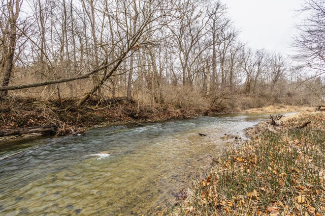 This $5.4M Indianapolis property featuring views of Williams Creek was a top home sale in the area in 2023, according to Zillow records.