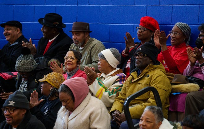 South side Indianapolis community members applaud Monday, Jan. 15, 2024, during a press conference at Stanley Strader Park Family Center highlighting recent renovations from Citizens Energy Group’s Sharing The Dream service project and the park’s name change that was made in 2023.