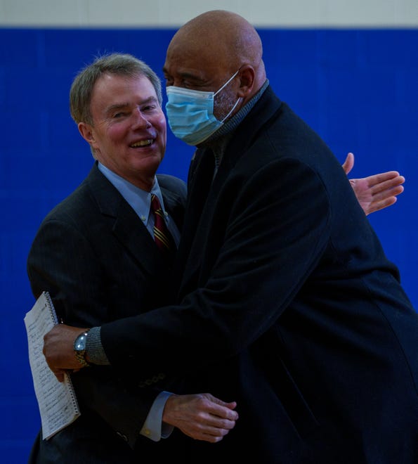 Indianapolis Mayor Joe Hogsett gets a hug Monday, Jan. 15, 2024, from Kenneth Strader, brother of the late Stanley Strader, a south side mentor, leader and longtime City-County councilman, after a press conference highlighting recent renovations from Citizens Energy Group’s Sharing The Dream service project and the park’s name change that was made in 2023. Stanley was a leader and advocate for the south side of Indianapolis and served 12 years on the City County Council.