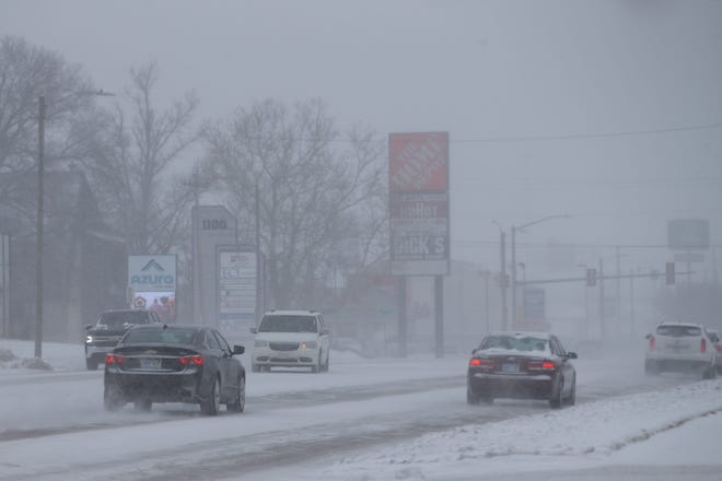 Bitter cold temperatures stayed in the Topeka area as a light snowfall fell Monday afternoon.