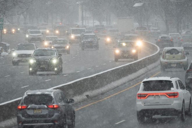 Snow falls on Route 4 in Hackensack, NJ on Tuesday Jan. 16, 2024.