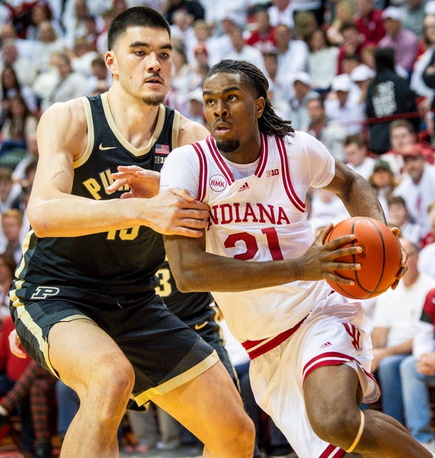 Indiana's Mackenzie Mgbako (21) drives past Purdue's Zach Edey (15) during the first half of the Indiana versus Purdue men's basketball game at Simon Skjodt Assembly Hall on Tuesday, Jan. 16, 2024.