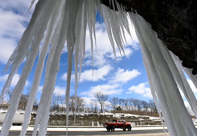 Icicles hang from the limestone along the Interstate 65 near Edgewood Avenue on Tuesday, Jan. 16, 2024, in Nashville, Tenn. The first winter of 2024 hit Middle Tennessee and below freezing temperatures are expected the rest of the week.