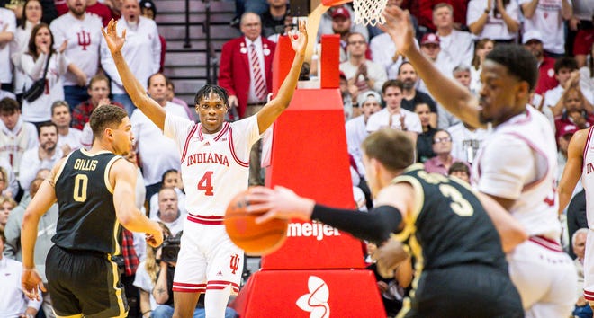 Indiana's Anthony Walker (4) looks to get the crowd excited during the first half of the Indiana versus Purdue men's basketball game at Simon Skjodt Assembly Hall on Tuesday, Jan. 16, 2024.