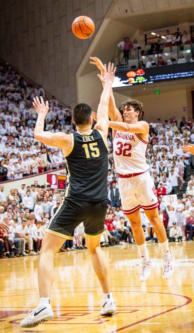 Indiana's Trey Galloway (32) shoots over Zach Edey (15) during the second half of the Indiana versus Purdue men's basketball game at Simon Skjodt Assembly Hall on Tuesday, Jan. 16, 2024.