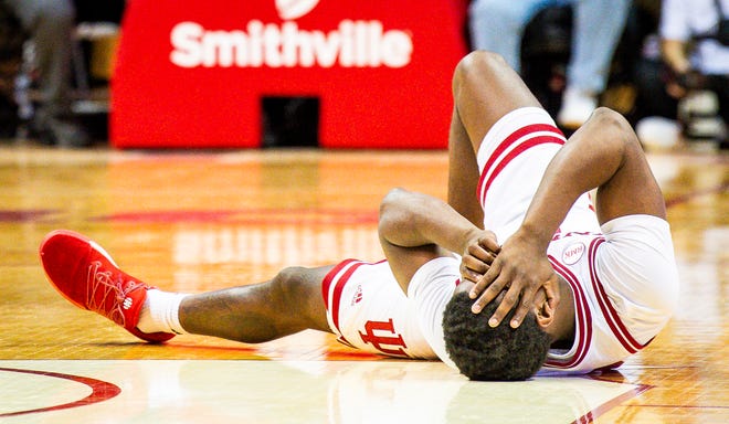 Indiana's Xavier Johnson (0) lays on the floor during the second half of the Indiana versus Purdue men's basketball game at Simon Skjodt Assembly Hall on Tuesday, Jan. 16, 2024.