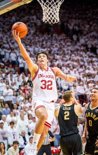 Indiana's Trey Galloway (32) scores during the second half of the Indiana versus Purdue men's basketball game at Simon Skjodt Assembly Hall on Tuesday, Jan. 16, 2024.